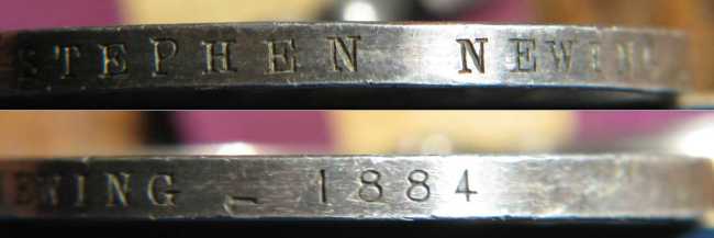 Edge detail of Stephen Newing's medal.